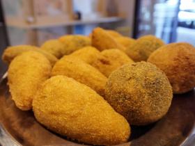 Arancine are a typical street food of Sicily